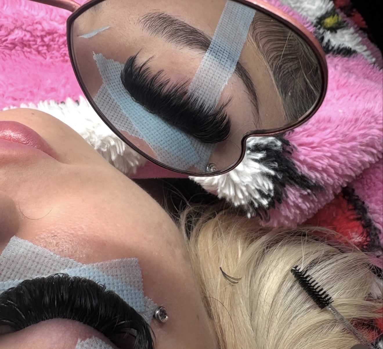 Close-up of brow and lash work by Exotic Blinkz